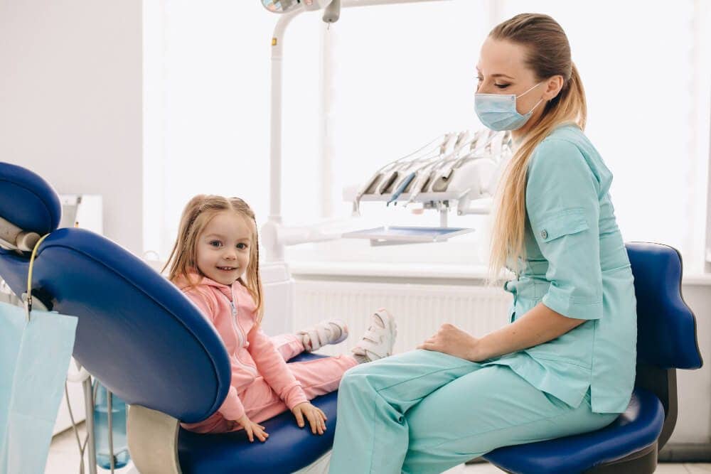 Child smiling during dental check-up in Yeronga
